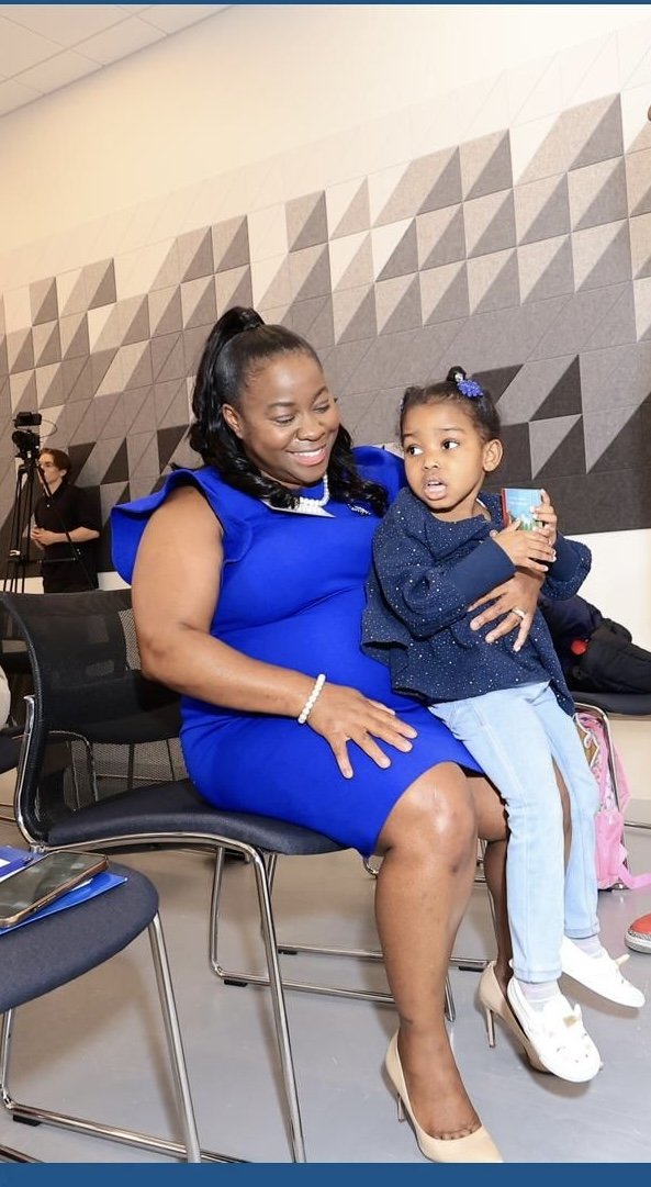 Adrienne McFarland with her family in the 6th Ward.