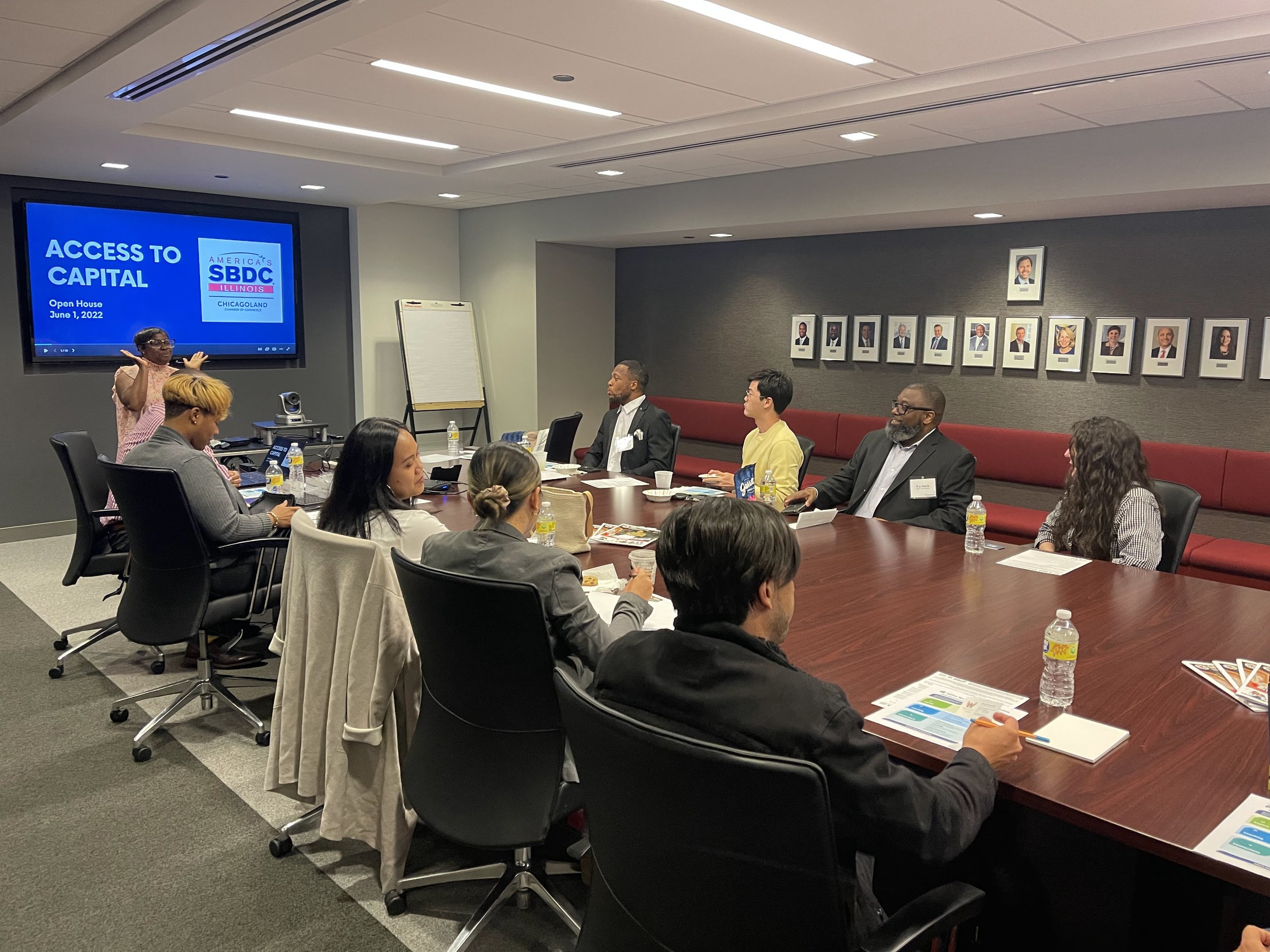 Adrienne McFarland presenting at a small business development event.